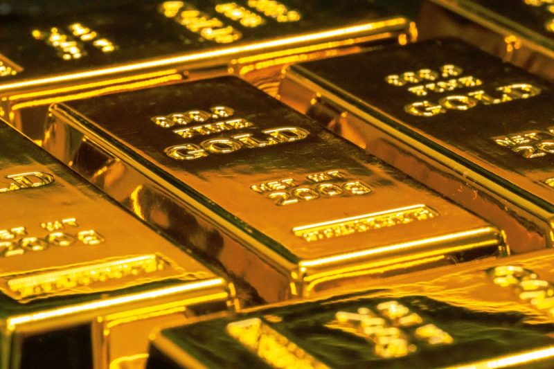 <strong>Leading gold analysis firm Metals Focus published its annual Precious Metals Investment Focus report</strong> <strong>on Saturday (October 25).</strong>
The report outlines the investment options available for those interested in leveraging rising demand for precious metals such as gold and silver. The report also highlights key supply and demand trends shaping the precious metals market and driving prices now and over the next 12 months.
Gold surged more than 65 percent from the start of 2025 to its record high of US$4,379.13 per ounce on October 17. Not to be outdone, silver skyrocketed by more than 88 percent to peak at its highest-ever price of US$54.47 per ounce on the same day. 
Although prices for both precious metals have since pulled back on profit-taking, Metals Focus believes the conditions that created these record high prices are still very much in play.
                            US trade policy driving gold prices in 2025                                
Metals Focus analysts attribute gold’s stellar performance in 2025 to a number of factors largely centered on growing global economic uncertainty and ongoing geopolitical conflicts. Gold’s safe haven status is highly favored in these conditions, attracting both retail and institutional investors as well as central banks.
However, the firm sees US President Donald Trump’s trade policies as the most influential: “In our view, the single most important factor has been uncertainty around US trade policy.”
Trump’s constant trade war waffling has businesses and governments scrambling to keep up and unable to plan for the future. As tariffs increase the price of goods while disrupting supply chains, inflation is becoming stickier. This is baking in more macroeconomic risks into the global economy, and in turn raising the risk for stagflation—an ideal environment for higher gold prices.
The Federal Reserve’s reversal of its monetary policy in mid-September 2025 with its first interest rate cut and the anticipation of further rate cuts to come are further boosting the gold price. The sustainability of growing US debt and the waning strength of the US dollar on the global stage are also price supporting factors for the yellow metal.
Central bank gold buying, which has reached record levels in recent years, also continued to be net positive in 2025, further driving demand. “Put together, these drivers explain why gold has not only reached fresh highs in 2025, but also why pullbacks have been shallow and short-lived, as investors have been rushing to buy dips,” states Metals Focus.
                            Silver shoots up on liquidity squeeze                                
The same forces sending gold prices to new heights are also bringing silver along for the ride. 
Silver often lags behind its sister metal, and this latest price cycle was no exception. However, investor belief that silver remains undervalued given strong industrial demand and unprecedented tight supply finally pushed the metal to break on through to the other side of a 45-year record high.
Metals Focus also points to the liquidity squeeze in the silver futures market, specifically concerning the COMEX in London. As the immediate supply of silver has not been enough to meet rising demand, the spot price for silver has risen higher than the price of futures contracts, a phenomenon known as backwardation. This creates a squeeze on short sellers who must now buy back silver contracts at higher prices. 
The situation amplified silver’s rally in early to mid-October. However, later in the month shipments of silver from New York and China helped to alleviate this pressure.
                            Gold price outlook for 2026                                
Looking forward, the trends underlying much of gold’s record-breaking price momentum are expected to remain strong well into next year. 
Metals Focus sees the price of gold posting another annual average high of US$4,560 per ounce as it heads toward US$5,000 in 2026, potentially reaching a record US$4,850 in the fourth quarter. 
These gains in gold are projected to materialize despite supply side growth. Metals Focus is forecasting a surplus of 41.9 million ounces in 2026, up 28 percent year-over-year. The firm sees gold mine production reaching another record high in 2026 at the same time that gold recycling could climb by 6 percent to a 14-year high in jewellery demand is likely to be affected by high prices, low consumer confidence, and economic uncertainty.
What will move gold prices higher in 2026?
Gold investors should take cues from interest rate moves, inflation levels, strength or weakness in the US dollar and sentiment surrounding the independence of the Federal Reserve. Of course, US trade policy will continue to be a main theme for precious metals over the next 12 months.
“As we have witnessed since the beginning of the Trump 2.0 administration, the abrupt and often unpredictable nature of US policy moves and the resulting uncertainty for the global trade system, and in turn the global economy, is expected to be a key driver of sentiment towards gold,” stated the firm.
Further driving demand, central banks around the world are expected to remain net buyers of safe-haven gold as the global push toward de-dollarization continues.
Gold and silver price outlook
<em><em>Chart via </em></em><em><em>Metals Focus</em></em>, Bloomberg<em><em></em></em>
                            Silver price outlook for 2026                                
As for silver, the white metal will continue to be seen as a more affordable alternative to gold. Metals Focus is looking for silver to average US$57 per ounce next year and even take a run at the US$60 level in mid-to-late 2026.
Silver has not only benefitted from safe-haven investor demand and strong industrial demand but also tight supply. Yet, the firm notes that the ongoing supply deficit for silver is expected to fall from 143.6 million ounces in 2024 to 63.4 million ounces in 2025. That figure is expected to shrink further to 30.5 million ounces in 2026.
Nevertheless, the silver market remains in a supply deficit at a time when demand is strong. “We therefore remain bullish towards silver for the rest of this year and 2026,” noted the report’s authors, who expect silver to continue outperforming gold at least in the first half of the new year.
In response, the gold:silver ratio has the potential to continue falling in 2026. However, Metals Focus believes the market will see this trend reverse in the back half of the year as silver loses some steam. 
Gold:silver ratio
<em><em></em></em><em><em>Chart via </em></em><em><em>Metals Focus</em></em><em><em>, Bloomberg</em></em>
                            Investor takeaway                                
Overall, Metal Focus is confident the precious metals bull market will continue throughout the remainder of 2025 and into 2026. Gold is especially benefitting from its safe-haven status at a time of heightened macroeconomic and geopolitical uncertainty. Silver is tracking gold’s ascent for the same reasons, in addition to tight above ground supply and sustained industrial demand.
For those who think they’ve missed out on the gains to be made in this latest precious metals bull cycle, there’s still plenty of upside to be had in the gold and silver markets in Q4 2025 and heading into 2026. 
<strong>Securities Disclosure: I, Melissa Pistilli, currently hold no direct investment interest in any company mentioned in this article.</strong>
This post appeared first on investingnews.com